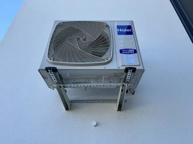 Air conditioning outdoor unit on a facade