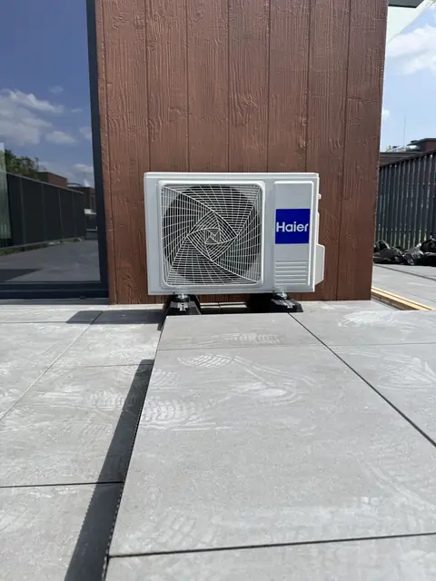 Air conditioning outdoor unit on a terrace
