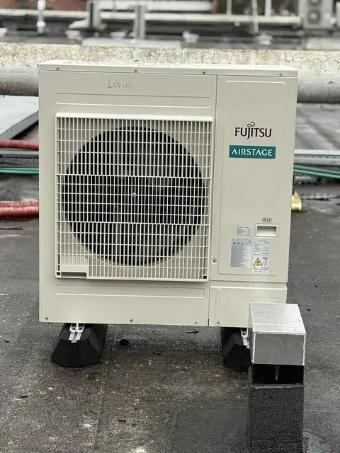 Air conditioning outdoor unit on a roof