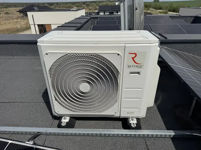 Air conditioning outdoor unit on a roof