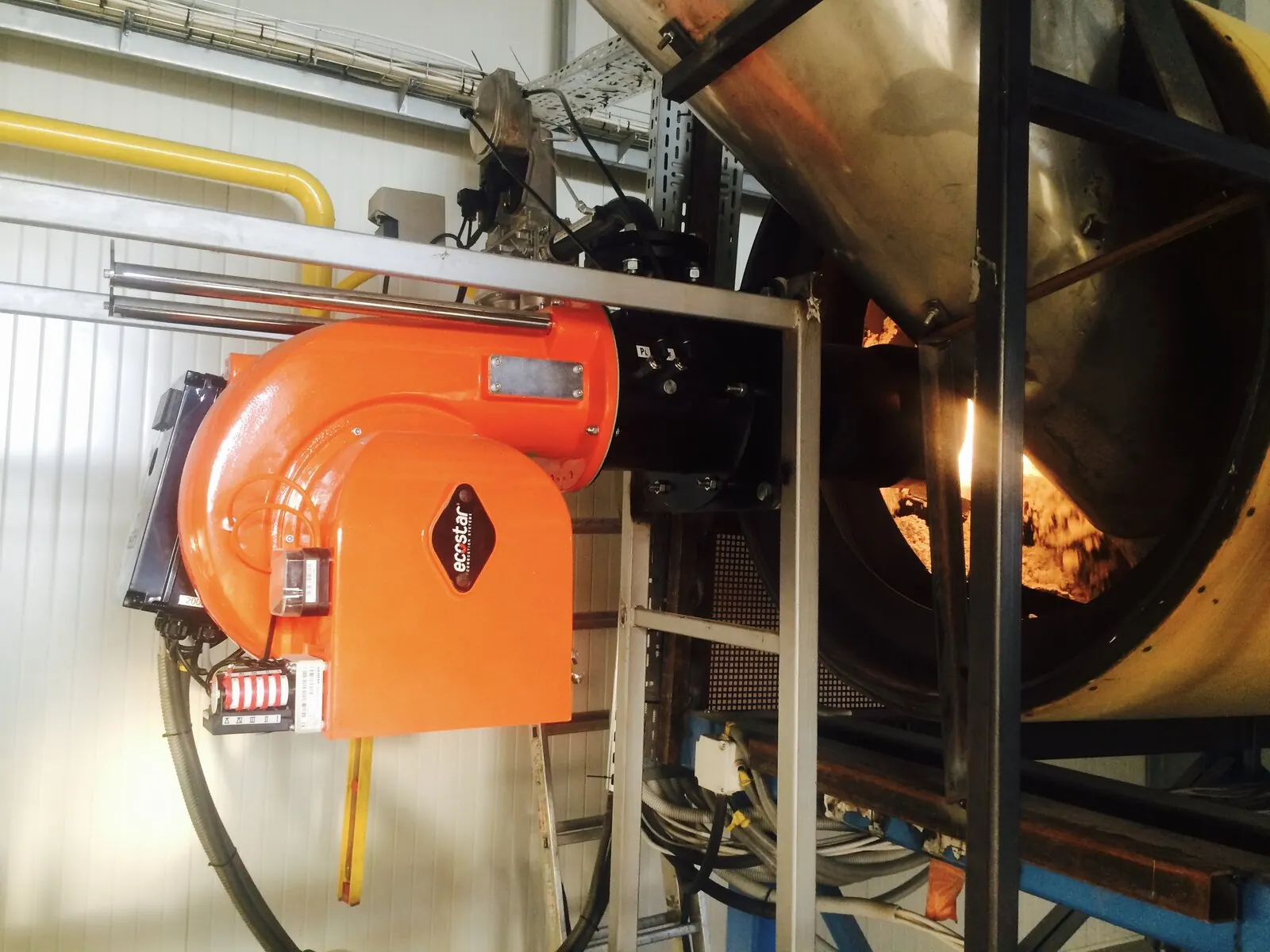 Burner in operation at an industrial installation